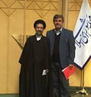تصویری از غلامرضا تاجگردون در کنار حجت الاسلام ابوترابی در مجلس